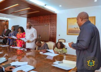 President Mahama swears in news National APRM Governing Council